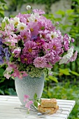 Colorful bunch of flowers on garden table