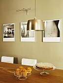 Cake and muffins on table in modern living room