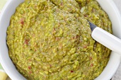 Bowl of Guacamole with a Spoon;From Above