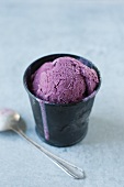 Homemade Blueberry Ice Cream Made with Maine Blueberries in a Metal Cup; Spoon