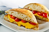 Grilled Cheese and Tomato Sandwich on a Roll; Halved