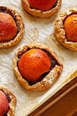 Peach and Chocolate Pastries with Confectioners Sugar