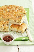 Focaccia with olives, thyme and sea salt and a dried tomato dip