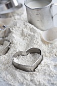 Baking ingredients and heart-shaped cutters