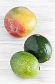 A mango and two avocados