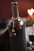 Mulled wine in a bottle with Christmas decoration