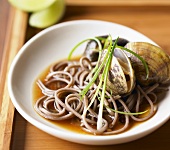 Asian Style Clams and Noodles in a Shallow Bowl
