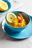 Lemon and rice soup with prawns