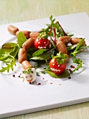 Sausages with tomatoes and salad