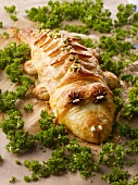 Minced meat wrapped in puff pastry shaped like a crocodile