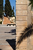 Mediterranean complex with lavish staircase in garden