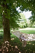 Blanket in backyard hammock