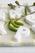 Table decoration with willow catkins & letters