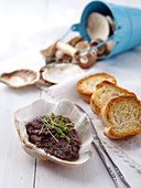 Tapenade with toasted sliced of bread