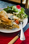 Goat's cheese and spinach pie with a side salad