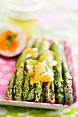 Fried asparagus with soft-boiled eggs