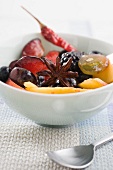 Spicy fruit salad with chilli peppers and star anise
