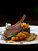 Braised shoulder of lamb with sesame seed pumpkin, aubergine mousse, pomegranate syrup and cumin sauce