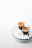 Two espressos with sugar