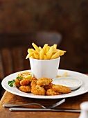 Bread, fried prawns with a dip and chips