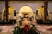 Sitting area with fireplace in courtyard