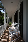 Wooden rocking chairs on front porch