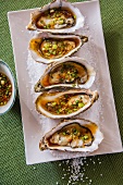 Oysters with a spicy sauce
