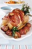 Bacon-wrapped roast turkey joint
