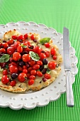 A summery tomato and bean salad on unleavened bread