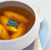 Chicken dumplings and saffron threads in broth (Bresse, France)