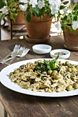 Farfalle with olives, courgette and anchovies