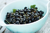 A bowl of blackcurrants