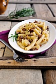 Penne pasta with Italian sausage, potato and rosemary