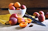 Fresh apricots, whole and halved