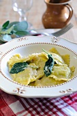 Spinach and ricotta filled ravioli with sage butter