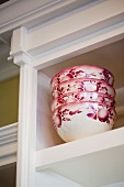 Stack of Pink and White Bowls