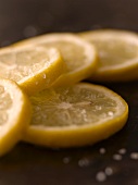 Fresh Lemon Slices Sprinkled with Sugar; Close Up