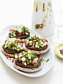 Lamb Burgers on Pita Bread Topped with Feta and Tomatoes