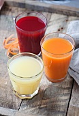 Apple juice, carrot and orange juice and beetroot and apple juice