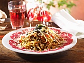 Taglierini with beef carpaccio, tomatoes, sage and Parmesan