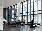 Sitting area with high ceilings and modern furniture