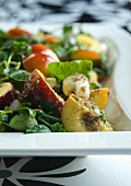 Nectarine and mozzarella salad with a green peppercorn dressing