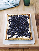 A puff pastry tart with lavender cream and blueberries