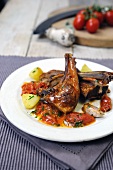 Lamp chops with tomatoes and olive sauce