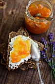 Wholemeal bread topped with cream cheese and melon jam