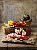 Vegetables and meats on wooden board