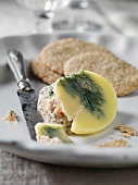 Plate of salmon pate with crackers