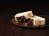 Slices of tiramisu on wooden board