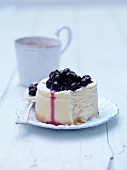 Plate of blackcurrant cheesecake