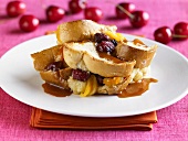 Bread pudding with cherries and caramel sauce